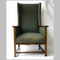 Baillie Scott, oak and inlaid wing armchair, photo on puritanvalues.co.uk.jpg